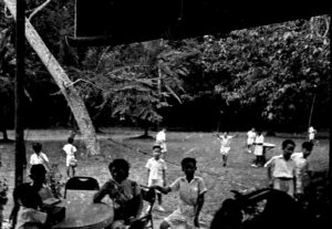 1955 Woon Poh Lin and students playing