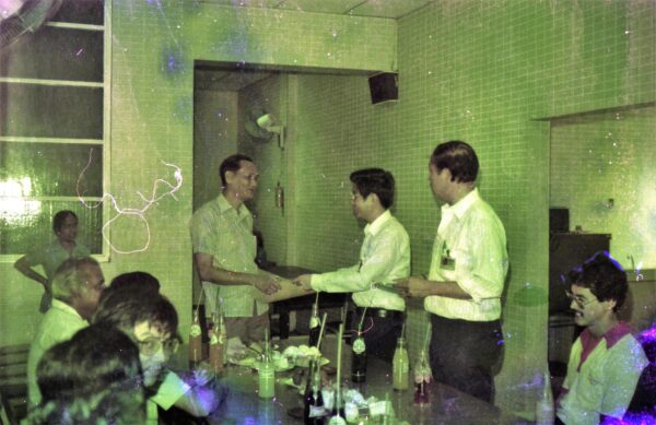 1973 - Woon Khai Boon receiving an award