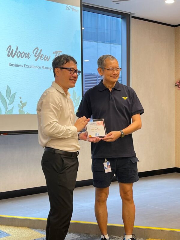 2022 Receiving IFF Long Service Award at Biopolis Building