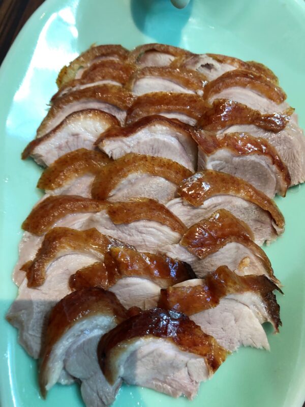 Well cut and prepared slices of Peking Duck meat