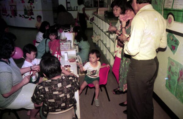 1990 Derrick at Kindergarten with Sally Fiona and Eng Sai
