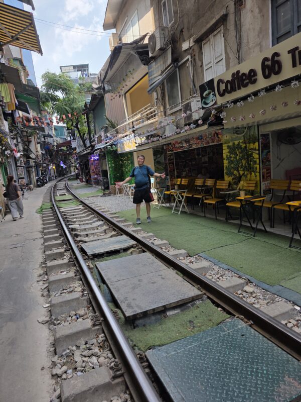 Day 4 - Watched the 4.10pm train passing by at Train Street South Entrance, sipping 40,000 dong fresh coconut juice